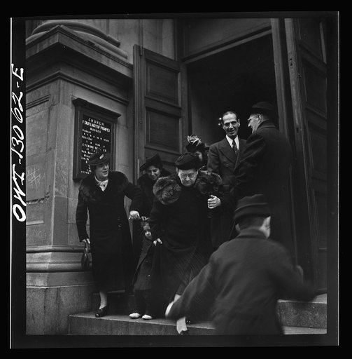 Untitled photo, possibly related to: New York, New York. Italian-Americans leaving the church of Our Lady of Pompeii at Bleecker and Carmine Streets, on New Year's Day