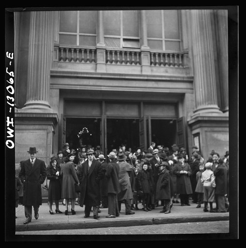 New York, New York. Italian-Americans leaving the church of Our Lady of Pompeii at Bleecker and Carmine Streets, on New Year's Day