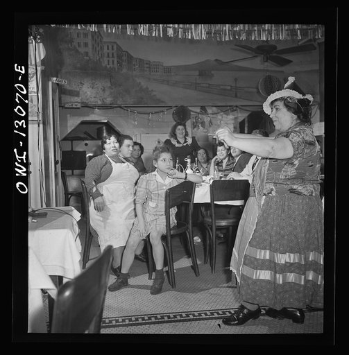 New York, New York. Gypsy woman who is habitue of Marconi's Restaurant on Mulberry Street. She dropped in for a bite to eat New Year's Eve, and did a spontaneous dance to entertain the Di Costanzos family party