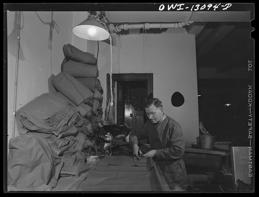 New York, New York. The War Emergency Board of the fur industry formed a fur vest project. Various fur factories donate the services of their employees one day a week to make fur-lined vests for the merchant marines. The fur in all from voluntary donations from the public. Jewish fur worker cutting 