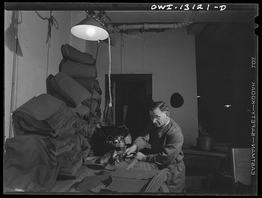 Untitled photo, possibly related to: New York, New York. The War Emergency Board of the fur industry formed a fur vest project. Various fur factories donate the services of their employees one day a week to make fur-lined vests for the merchant marines. The fur in all from voluntary donations from t