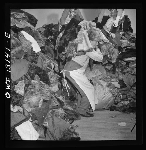 New York, New York. The War Emergency Board of the fur industry formed a fur vest project. Various fur factories donate the services of their employees one day a week to make fur-lined vests for the merchant marine. The fur is all from voluntary donations from the public. Fur coats being moved from 