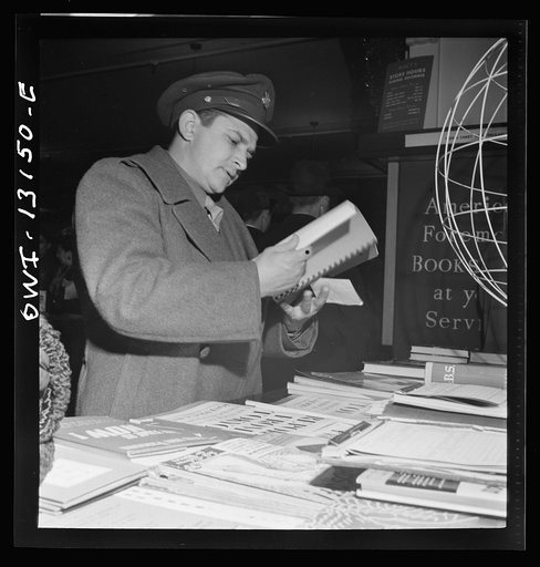 Untitled photo, possibly related to: New York, New York. R. H. Macy and Company department store during the week before Christmas, in the book department