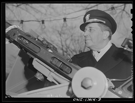 Washington, D.C. Admiral Woodward of the United States Naval Ordnance examining 120 mm gun