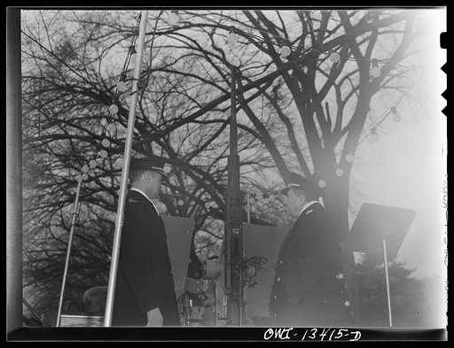 Untitled photo, possibly related to: Washington, D.C. Admiral Woodward of the United States Naval Ordnance addressing crowd gathered to view 120 mm gun