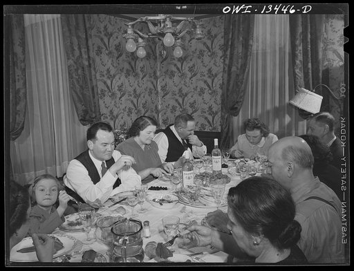 New York, New York. Sunday dinner in the Martinetti home. He ia a restaurant owner who lives in the Bronx. He is one of three partners in the restaurant, it is on lower Fifth Avenue, which caters to businessmen