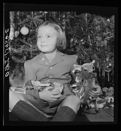 New York, New York. Martinetti grandchild and her Christmas tree