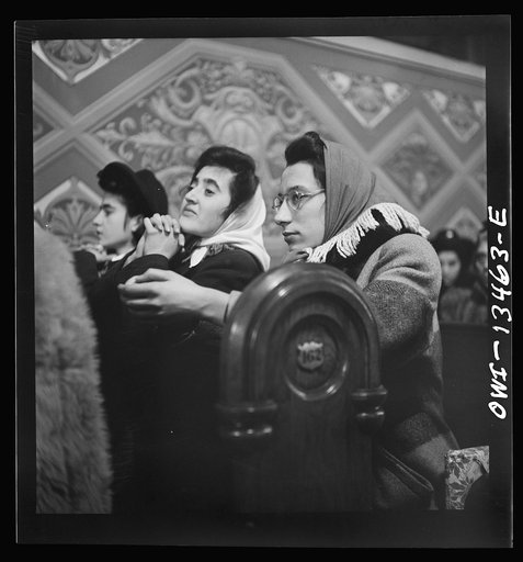 New York, New York. Midnight mass on Christmas Eve in Saint Dominick's church on Sullivan Street