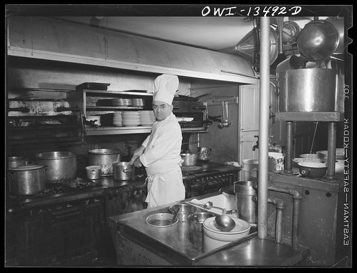 Untitled photo, possibly related to: New York, New York. Chef in Sixty-Eight restaurant on Fifth Avenue at Thirteenth Street