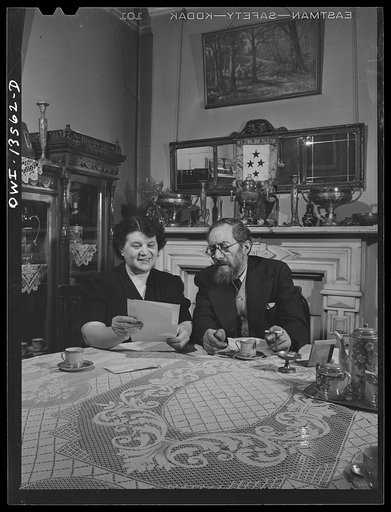 New York, New York. Mr. and Mrs. Raymond [i.e. Raimondo] Fazio reading a letter from their son in the United States Army in Africa. Mr. Fazio is a journalist. They have three other sons in the Army in training in the United States