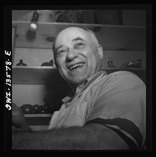 New York, New York. Kitchen worker in the Minetta Tavern on MacDougal Street