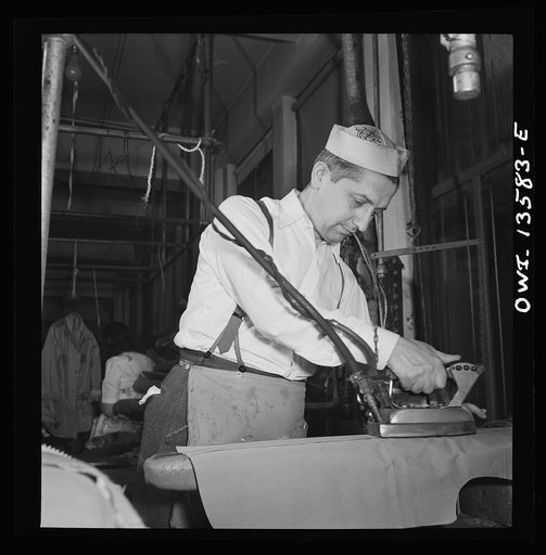New York, New York. Garment worker in the N.M. dress shop, which is now making blouses for the Women's Army Auxiliary Corps (WAAC). He is a member of local 89 of the International Ladies Garment Workers' Union