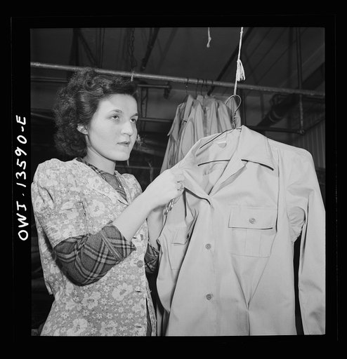 Untitled photo, possibly related to: New York, New York. Jewish worker in the N.M. dress shop which is now making blouses for the Women's Army Auxiliary Corps (WAAC). [S]he is a member of local 89 of the International Ladies Garment Workers' Union