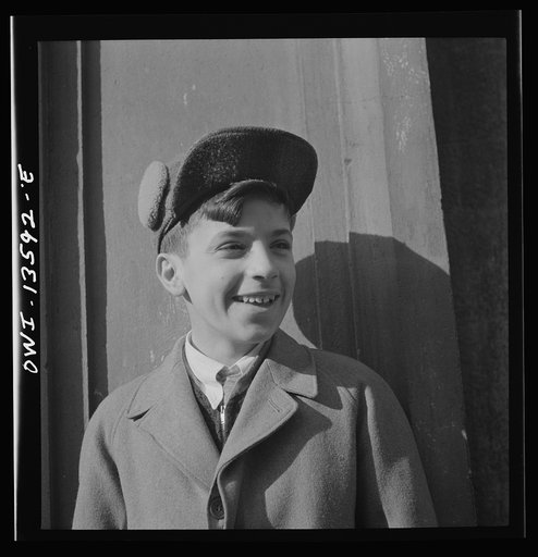 New York, New York. Boy on Mott Street dressed in his Sunday best