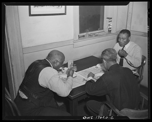 Washington, D.C. Firehouse Station No. 4. Fireman eating a noon day meal