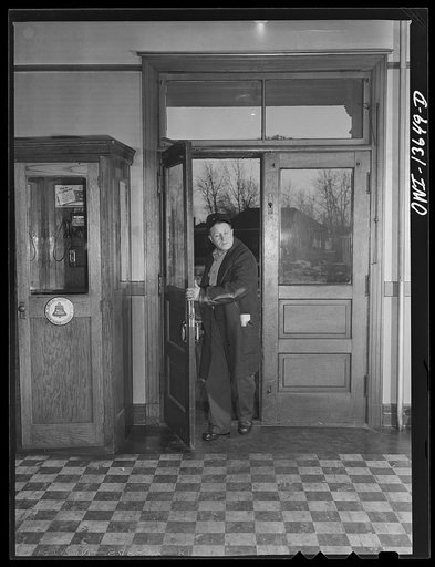 Gibson, Indiana. Railroad worker coming into the railroad (YMCA) Young Men's Christian Association after a day's work on the Indiana Harbor Belt railroad