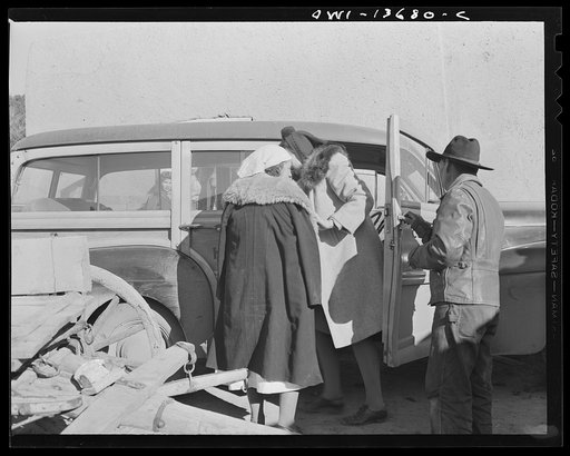 Penasco, New Mexico. An obstetrical case being rushed to the hospital at Embudo