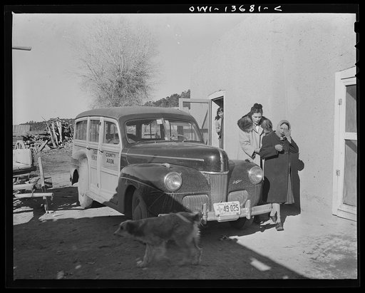 Penasco, New Mexico. An obstetrical case being rushed to the hospital at Embudo