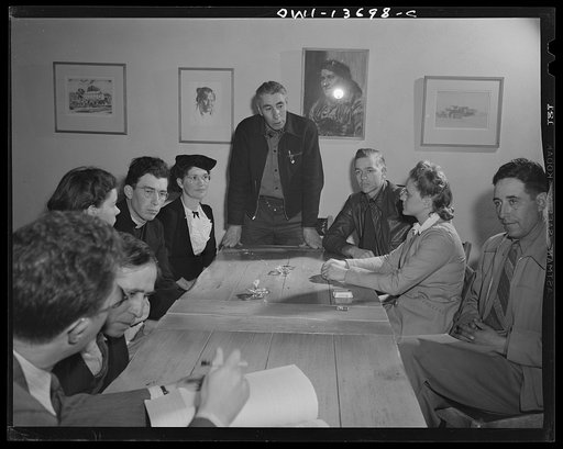 Untitled photo, possibly related to: Taos, New Mexico. Meeting of the Board of Directors of the Taos County cooperative health association. Secretary; four Spanish-Americans representing the different regions: Father Cassidy from Penasco; a nurse from Questa; a nurse from Penasco; Father Smith from 