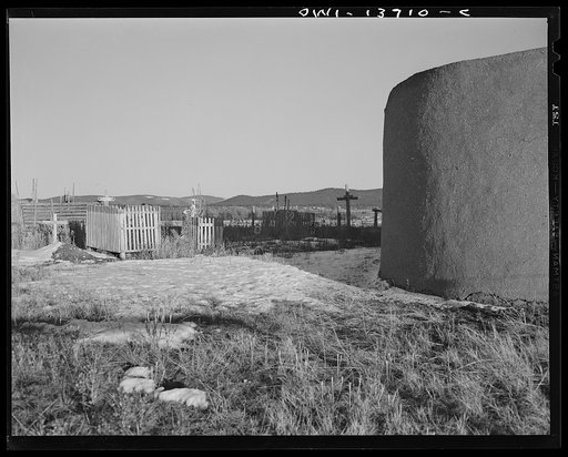 Llano, near Penasco, New Mexico. The graveyard behind the church of Penitente Miranda