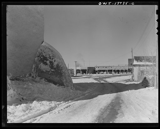 Ranchos de Taos, New Mexico. The plaza seen over the buttress of the church