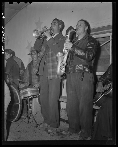 Untitled photo, possibly related to: Penasco, New Mexico. A native band at a dance. J. L. Lopez Orchestra