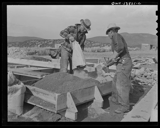 Penasco, New Mexico. Pouring the foundations of the new building for the clinic operated by the Taos County cooperative health association