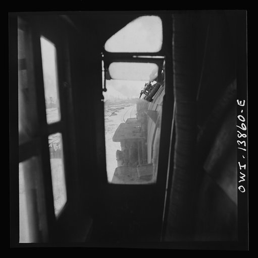 Untitled photo, possibly related to: Freight operations on the Indiana Harbor Belt railroad between Chicago, Illinois and Hammond, Indiana. View through the window of the engineer's side of the cab. Ready to pull out of the yard, the engineer waits for the switchman to throw the switch