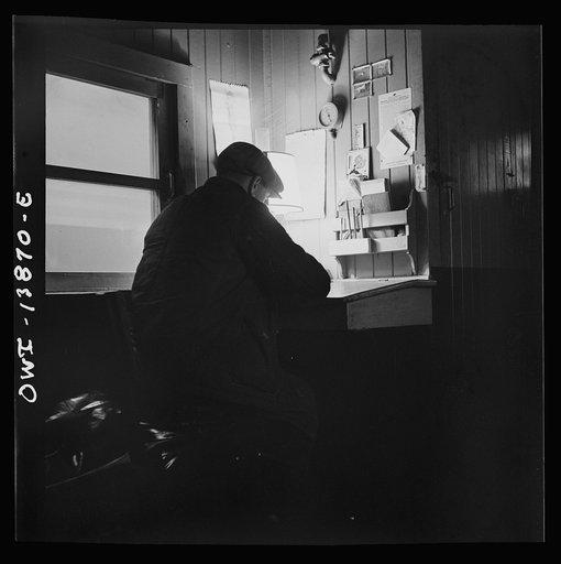 Freight operations on the Indiana Harbor Belt railroad between Chicago, Illinois and Hammond, Indiana. As soon as the train is under way, Conductor Cunningham gets to work on his bills and records