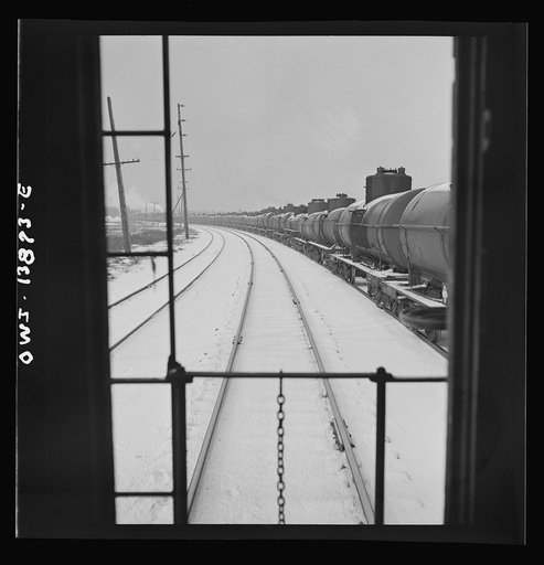 Freight operations on the Indiana Harbor Belt railroad between Chicago, Illinois and Hammond, Indiana. As the train goes through Argo, Illinois, it passes a long train of oil tank cars of the Baltimore and Ohio railroad