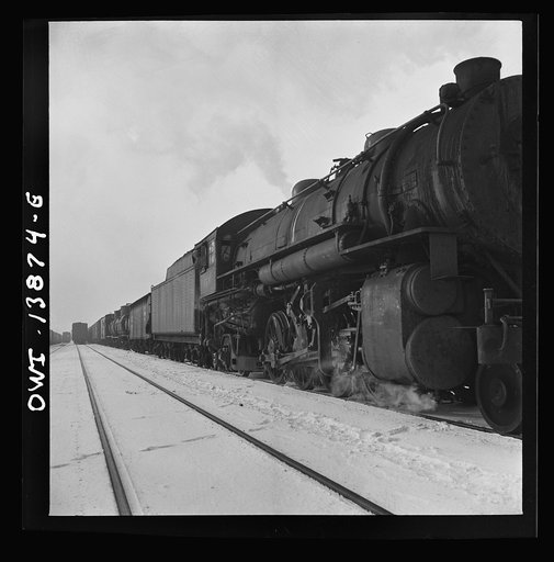Freight operations on the Indiana Harbor Belt railroad between Chicago, Illinois and Hammond, Indiana. The train to be picked up is in two sections and has to be doubled up