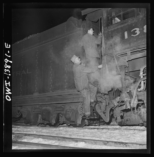 Freight operations on the Indiana Harbor Belt railroad between Chicago, Illinois and Hammond, Indiana. After the day's work, the engineer and fireman are back at the yard after midnight