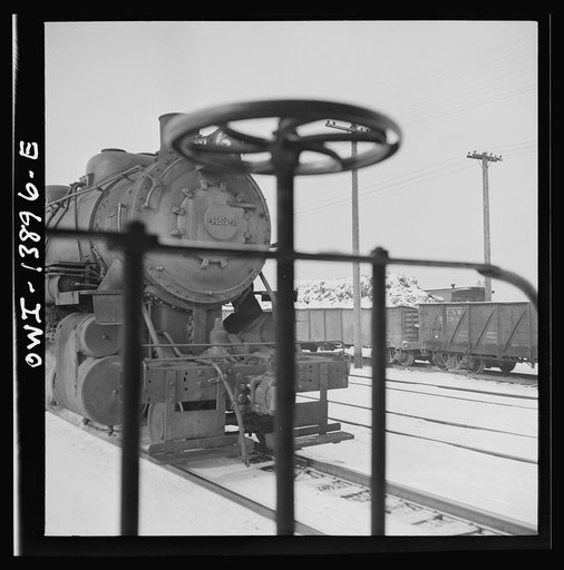 Untitled photo, possibly related to: Freight operations on the Indiana Harbor Belt railroad between Chicago, Illinois and Hammond, Indiana. The train passes another Indiana Harbor Belt train on its way to make a delivery