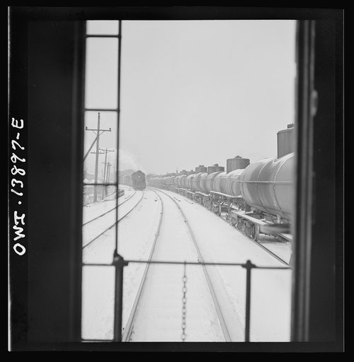Freight operations on the Indiana Harbor Belt railroad between Chicago, Illinois and Hammond, Indiana. As the train goes through Argo, Illinois, it passes a long train of oil tank cars of the Baltimore and Ohio railroad