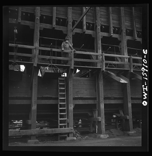 Untitled photo, possibly related to: Milwaukee, Wisconsin. At the coal hoppers on the Fourteenth Street dock of the Milwaukee Western Fuel Company