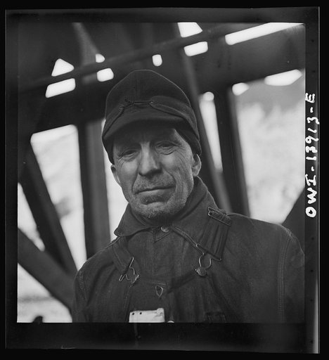 Milwaukee, Wisconsin. A worker at the Fourteenth Street coal dock of the Milwaukee Western Fuel Company