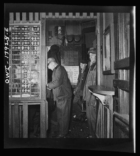 Freight operations on the Indiana Harbor Belt railroad between Chicago, Illinois and Hammond, Indiana. The train crew, consisting of the conductor and the brakemen, reports at the yard office for their orders of the day