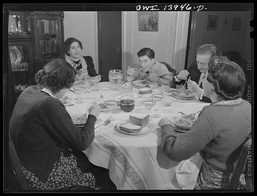 Corona, Long Island, New York. Family of Raymond [i.e. Vincenzo] Fazio eating supper in their home. Fazio and his wife are garment workers in the dress business