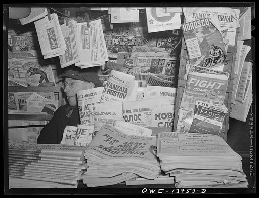 New York, New York. Newsstand on Fourth Avenue at Fourteenth Street which sells foreign language newspapers