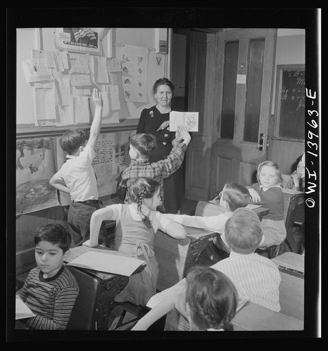 New York, New York. Teacher and pupils in classroom at Public School Eight