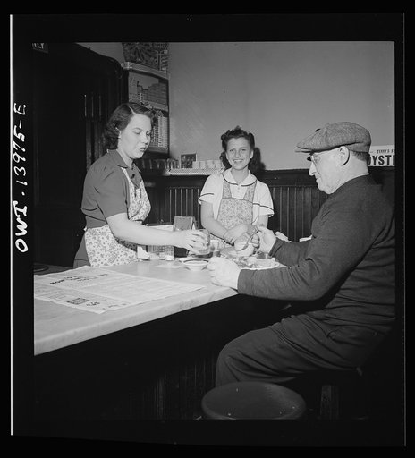 Clinton, Iowa. Engineer Johnny Johnson having his dinner at the depot lunchroom