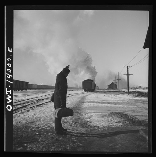 Freight train operations on the Chicago and Northwestern Railroad between Chicago and Clinton, Iowa. At the end of the trip, the engine goes off to the roundhouse as conductor Wolfsmith waves good-bye to the engine crew
