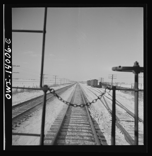 Freight train operations on the Chicago and Northwestern Railroad between Chicago and Clinton, Iowa. On its way back from Clinton, Iowa, the train passes many sidings where stock cars wait to be loaded with cattle