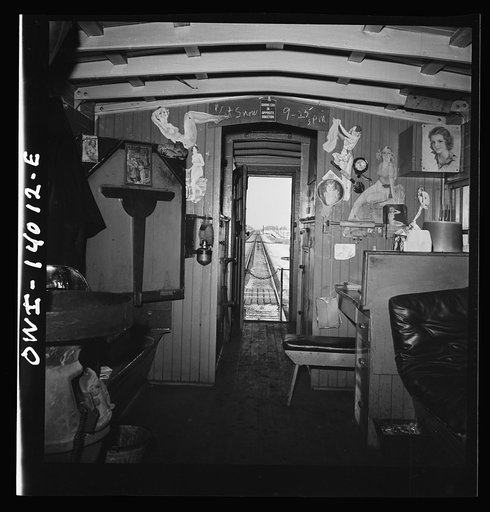 Freight train operations on the Chicago and Northwestern Railroad between Chicago and Clinton, Iowa. The caboose is the conductor's second home. He always uses the same one and many conductors cook and sleep there while waiting for trains to take back from division points