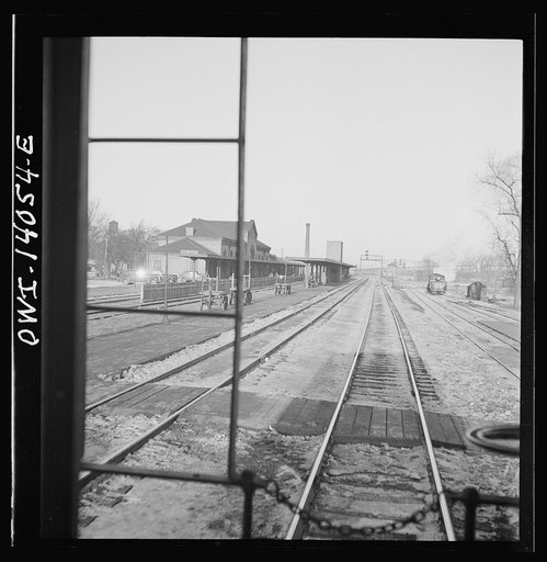 Freight train operations on the Chicago and Northwestern Railroad between Chicago and Clinton, Iowa. The train going through the town to the yard which is two miles beyond