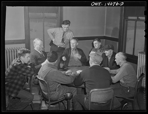 Gibson, Indiana. A card game is nearly always in progress in the lobby of the railroad YMCA (Young Men's Christian Association)