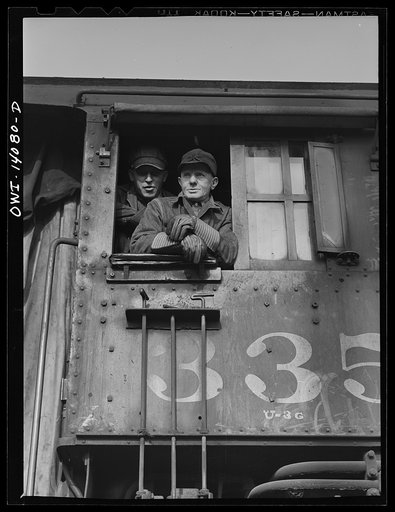 Chicago, Illinois. Engineer and fireman of an Indiana Harbor Belt railroad engine