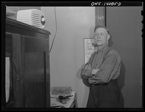 Untitled photo, possibly related to: Gibson, Indiana. Hiram Gilman, engineer on the Michigan Central railroad for twenty-five years, who stops at the railroad YMCA (Young Men's Christian Association)