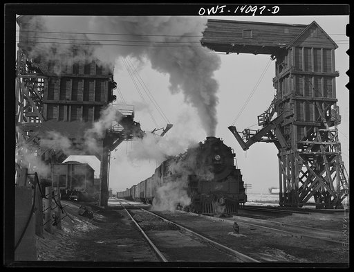 Nelson, Illinois. Chicago and Northwestern Railroad freight stopping for coal and water enroute from Clinton, Iowa to Chicago, Illinois