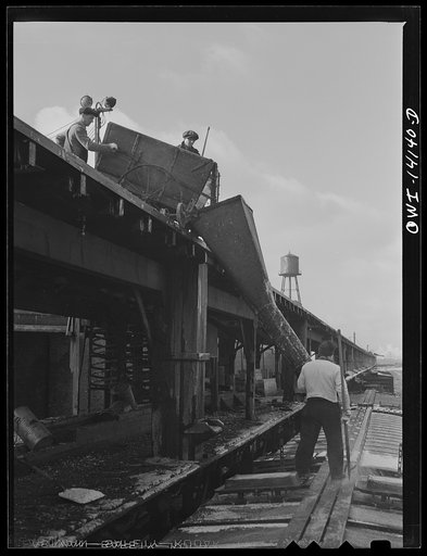 Untitled photo, possibly related to: Icing a car at the icing platform of the Indiana Harbor Belt Railroad